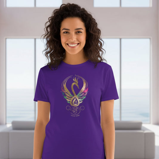 Women wearing purple shirt with Mystic Glow swan emblem from the Celtic Swan Collection.